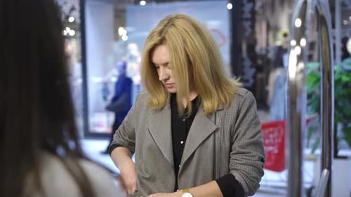 Unrecognizable Shop Assistant Stopping Woman Without Covid-19 Face Mask Entering Store. Portrait of