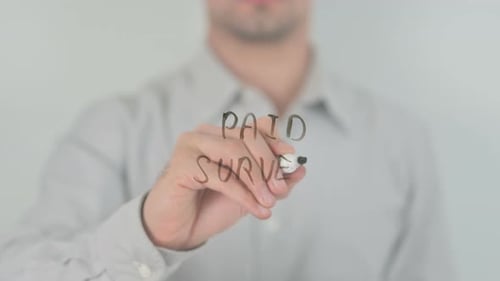 Writing Paid Survey on Clear Glass Surface