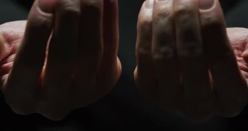 Red and Blue Pills in Open Palms