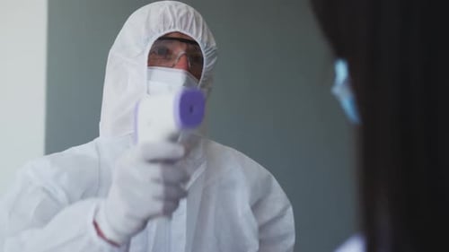 Temperature Check with PPE and Contactless Thermometer