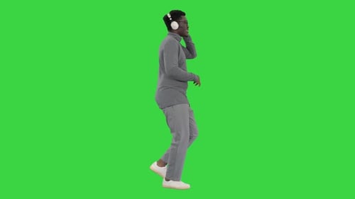 Adult Man Dancing with Headphones in Chroma Key