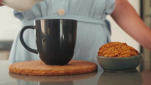 Adding Cream to Coffee