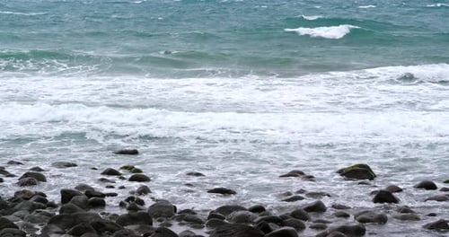 Beautiful sea waves with stone and rock