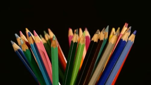 Colour Pencils Isolated on Black, Rotation