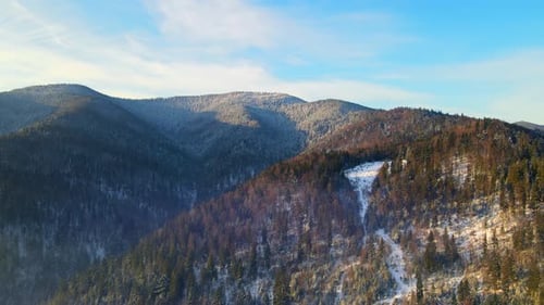 Winter Landscape of Sunrise Over the Mountains in Winter