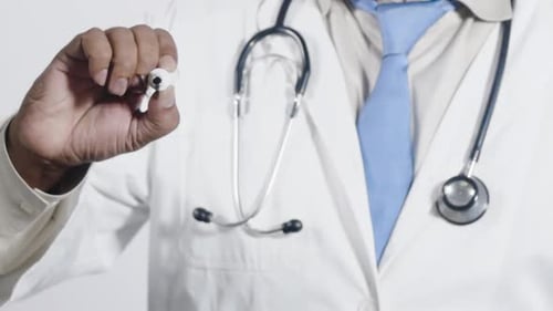 Asian Doctor Writes Laboratory