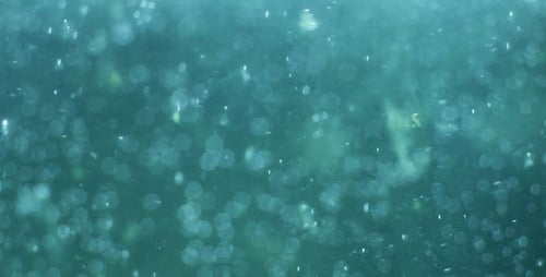 Blue Particles Water Bokeh Background Loop 2