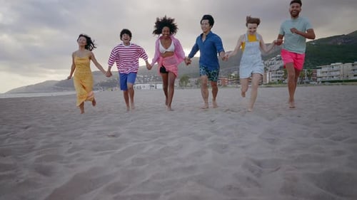 Group of friends having fun on the beach.