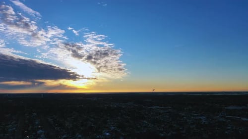 Sunrise Over City Skyline Aerial Shot