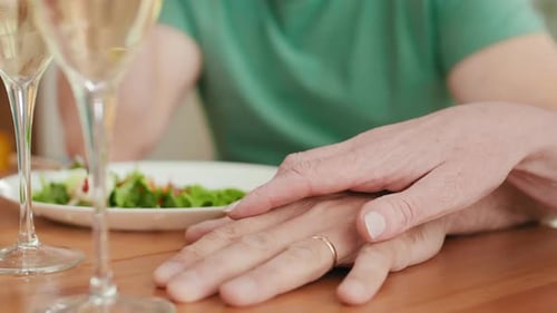 Hands of Loving Senior Couple