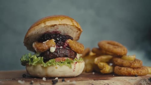 Delicious Burger and Fries on Wooden Surface