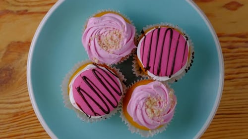 Close Up Delicious Cakes Rotating on Showcase in Shop