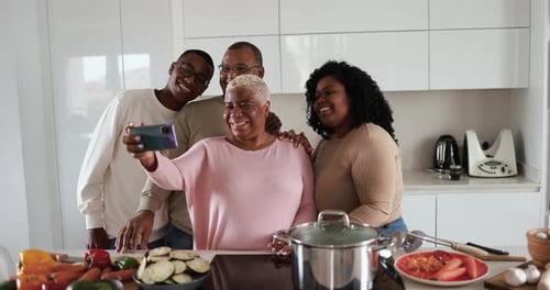 Happy Family Taking Selfie in Kitchen