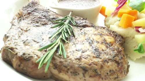 Delicious Steak with Potato Salad and Gravy