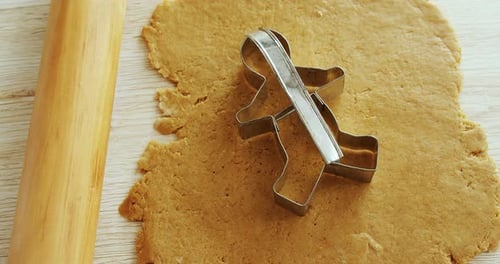 Cutting Gingerbread Man Cookies From Rolled Dough