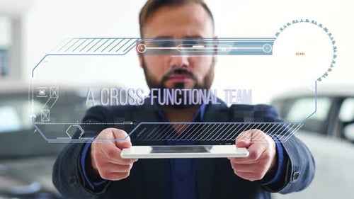 Businessman Holds a Tablet with HUD Futuristic Elements. Hologram with an Inscription - A Cross