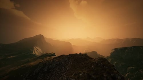 High Mountain Peaks Covered with Dramatic Heavy Fog