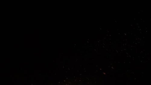 Abstract Fire Embers and Sparks on Black