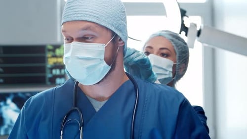 Professional medical doctors working in emergency medicine. Portrait of surgeon and the nurse.