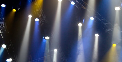 Dynamic Stage Lighting with Blue, White, Yellow Beams