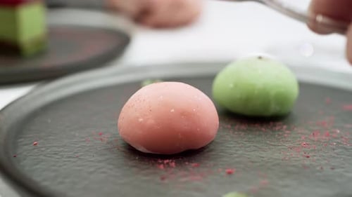 Colorful Japanese Mochi Dessert Pressed with a Fork