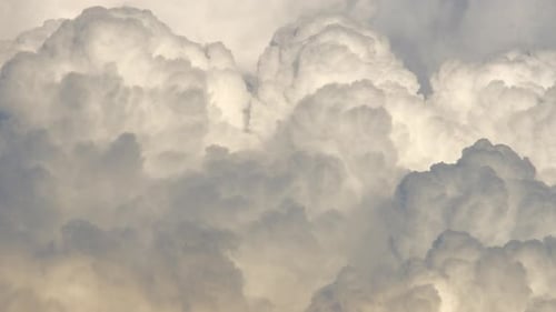 Fluffy cloud time lapse on a cloudy day 4k footage.