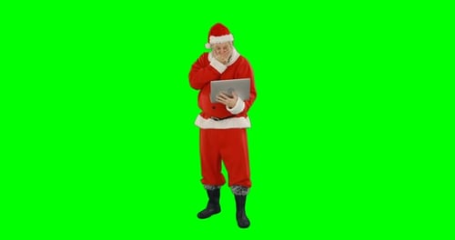 Santa claus using laptop 4k
