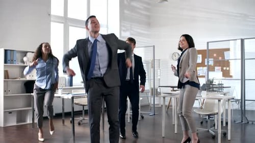 Excited Office Workers Celebrate Together