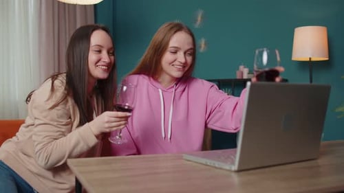 Young Women Video Chatting with Wine