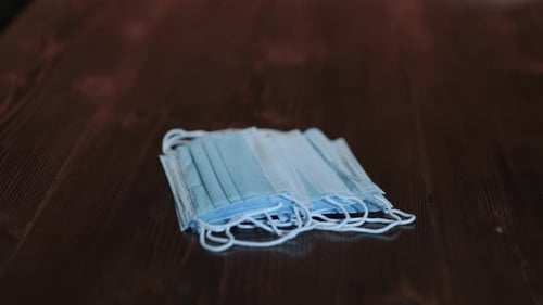 Close Up of Surgical Face Masks on Table