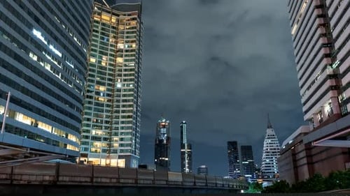 Time Lapse View of Skyscrapers in Business District at Night Time