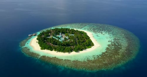 Aerial drone view of scenic tropical islands in the Maldives.