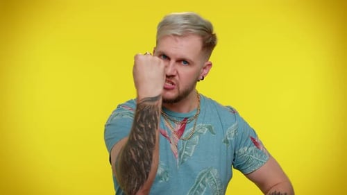 Angry Man Gesturing Threateningly with Fists
