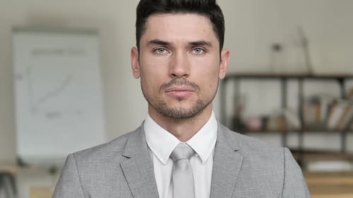 Close Up of Serious Young Man in Suit