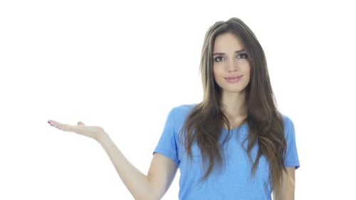 Woman Presenting with Hand to Side on White