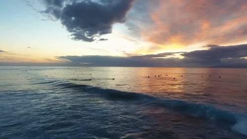 Romantic Sunset and Evening Surf In The Ocean