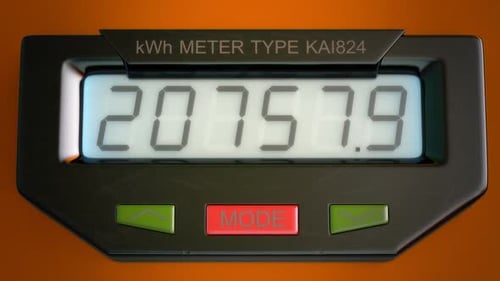 Digital electricity meter showing household consumption in kilowatt hours.