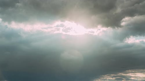 Sunrays Sunray Shine Through Dark Clouds In Cloudy Blue Sky