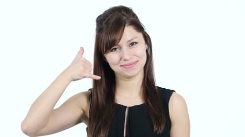 Woman Makes Call Me Hand Gesture Smiling