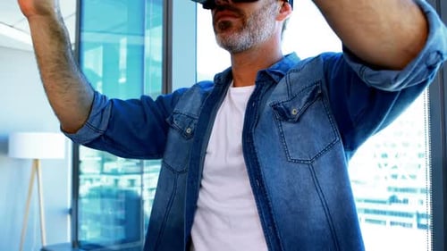 Man Experiences Virtual Reality in Modern Apartment