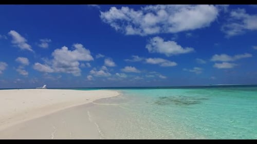 Aerial top view sky of tranquil seashore beach adventure by transparent lagoon and white sandy backg