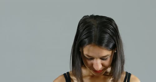 Attractive Woman Smiling in Studio Close-Up