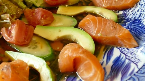 Salmon Salad with Fresh Vegetables on Decorative Plate