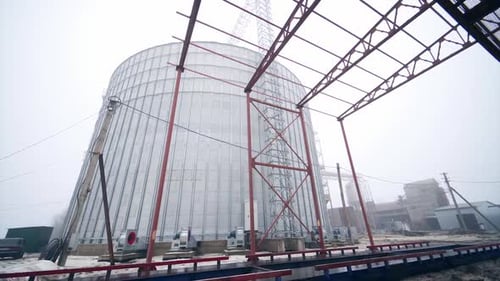 Large metal hangar for grain. Grain storage elevator, Large metal hangar for grain.