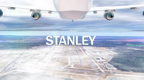 Avião comercial sobre nuvens chegando à cidade Stanley