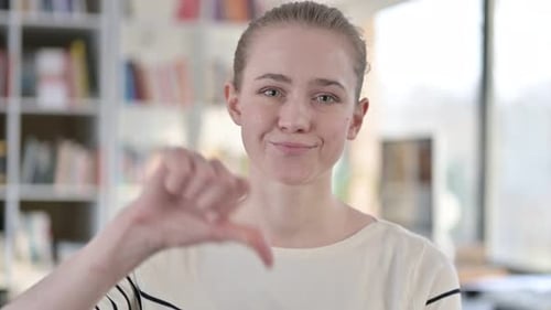 Woman Gives Thumbs Down Gesture Close Up Shot