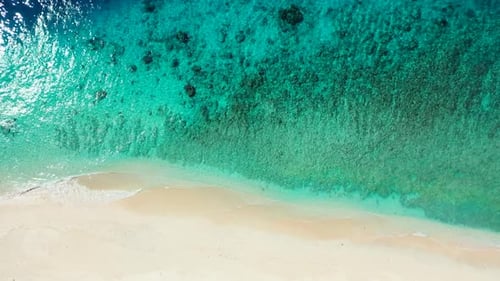 Aerial top down seascape of beautiful bay beach adventure by blue sea with white sand background of