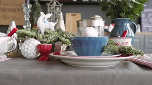 Festive Table Setting with Christmas Decorations