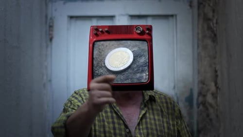 Person With Television for Head in Dimly Lit Room