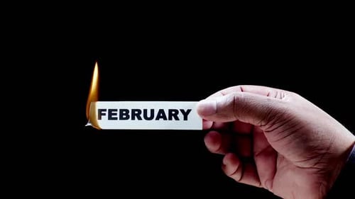 Burning Paper with Text of Month of February